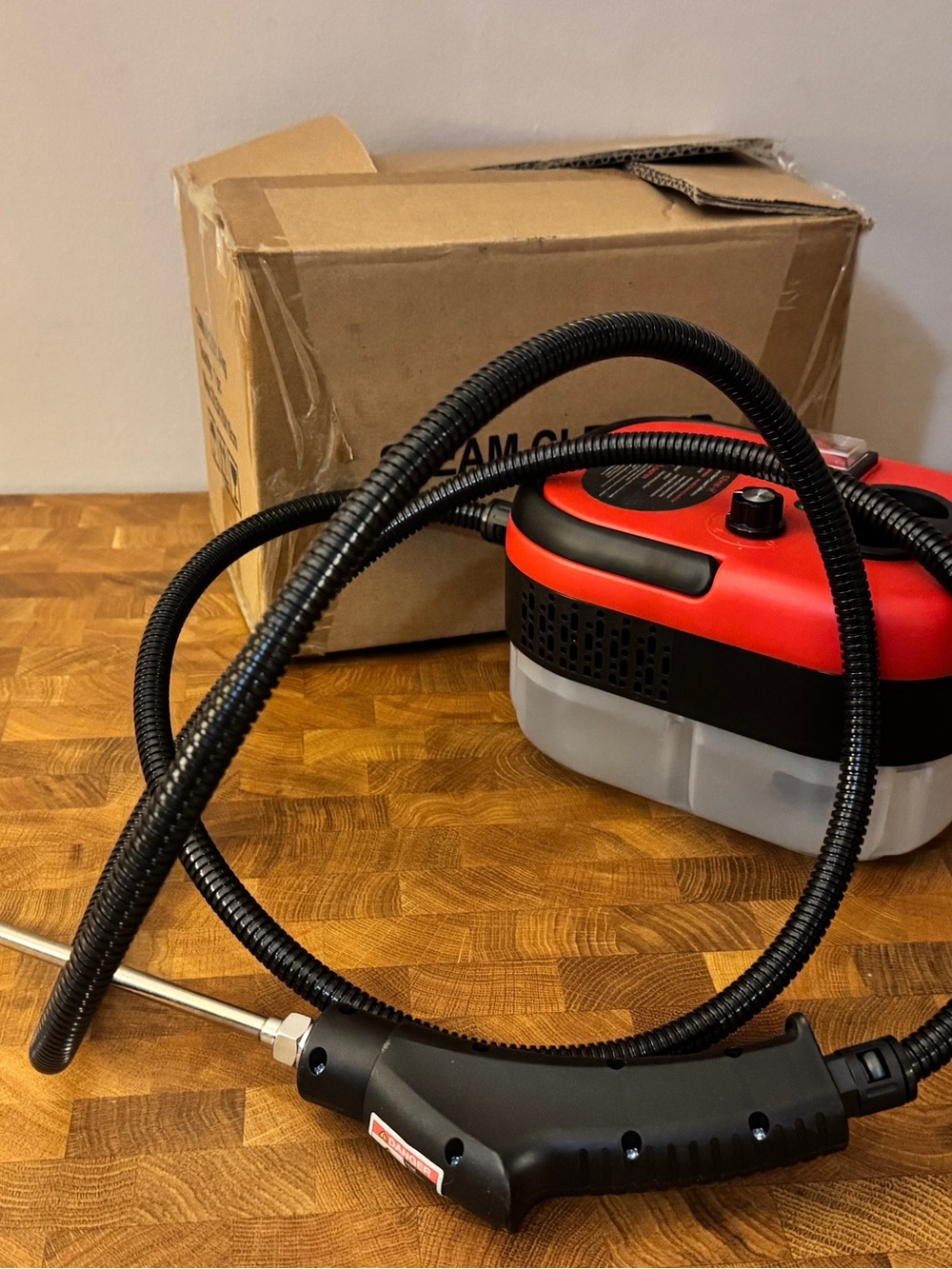 Red and Black Portable Steam Cleaner